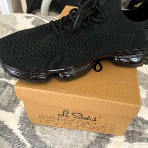 Brand new La Sheelah black sneakers